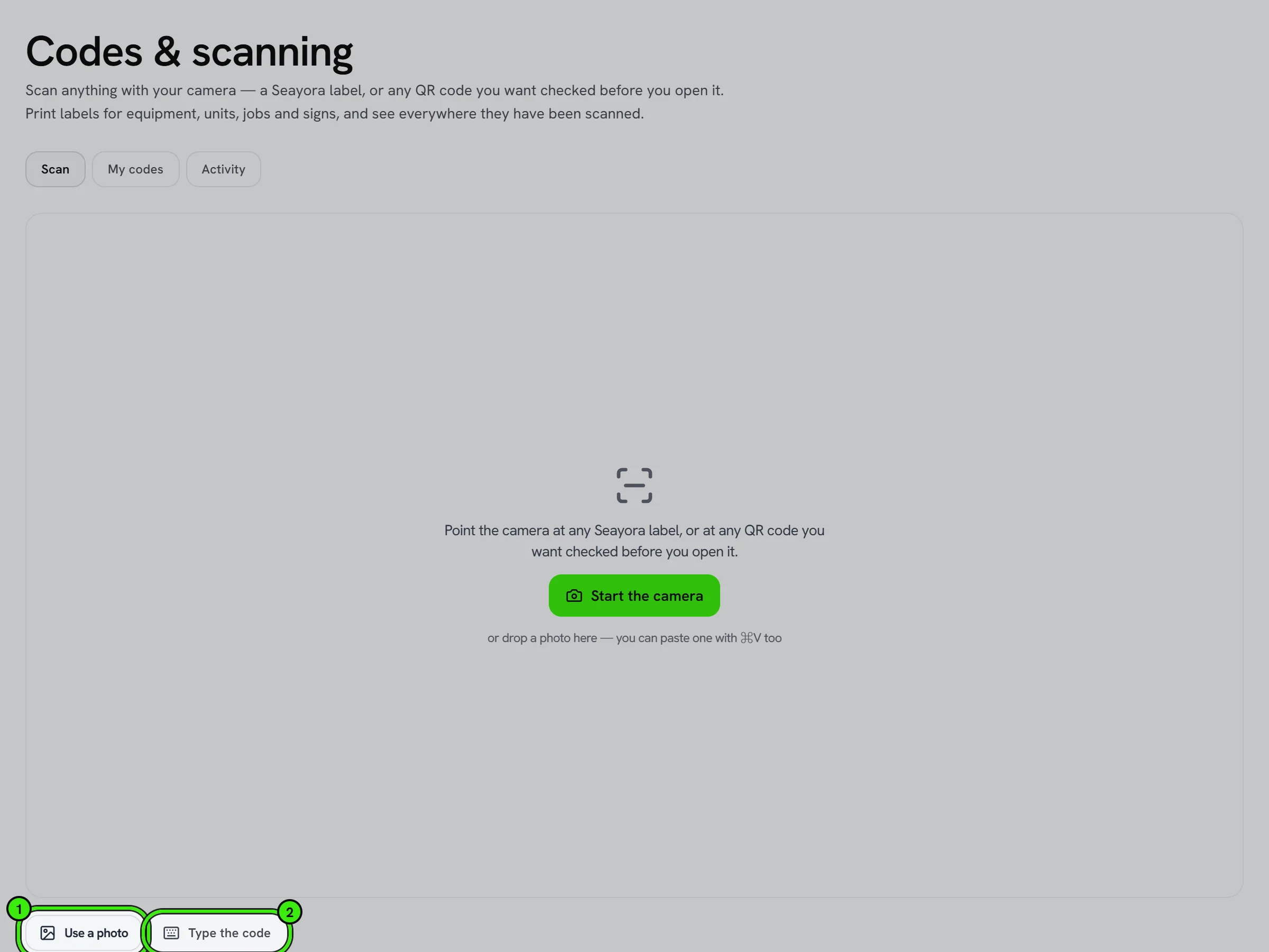 Operations → Assets → Codes & scanning, Scan tab: a camera area with Start the camera, and underneath it Use a photo ringed as 1 and Type the code ringed as 2.