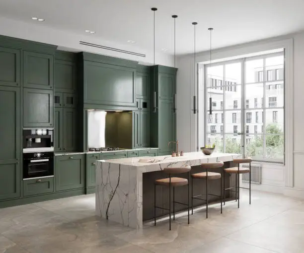 Modern kitchen with green cabinetry, marble island, and large window.